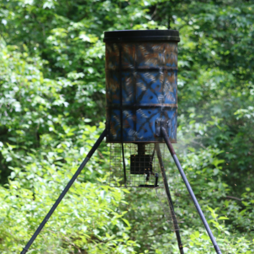 Deer feeder stand in the woods